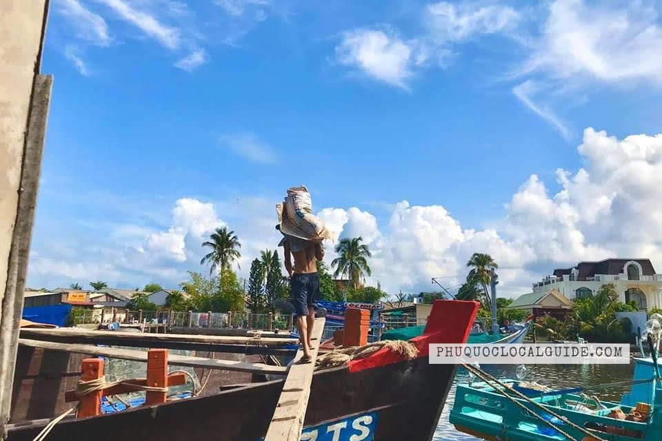 Phu Quoc Local work along river in fishing village